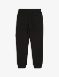 Stone Island Brand-patch Tapered Cotton-jersey Jogging Bottoms 5 Stone Island Brand-patch Tapered Cotton-jersey Jogging Bottoms -Selfridges Store R03791753 BLACK ALT02