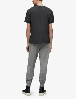 AllSaints Raven Logo-embroidered Tapered-leg Cotton-jersey Jogging Bottoms -Selfridges Store R03969366 STEREOGREY ALT03
