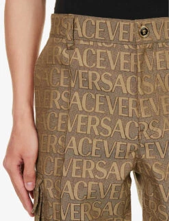 Versace Logo-print Tapered-leg Mid-rise Canvas Trousers -Selfridges Store R04181567 BROWNBEIGE ALT04