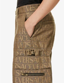 Versace Logo-print Tapered-leg Mid-rise Canvas Trousers -Selfridges Store R04181567 BROWNBEIGE ALT05