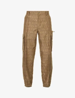 Versace Logo-print Tapered-leg Mid-rise Canvas Trousers