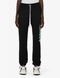 Amiri Floral Logo-print Tapered Cotton Jogging Bottoms -Selfridges Store R04191415 BLACK ALT02