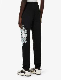 Amiri Floral Logo-print Tapered Cotton Jogging Bottoms -Selfridges Store R04191415 BLACK ALT03