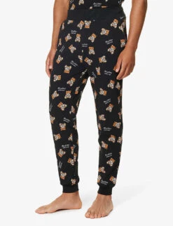 MOSCHINO Bear-motif Ribbed-waistband Stretch-cotton Pyjama Bottoms -Selfridges Store R04199719 FANTASYPRINTBLACK555 ALT02